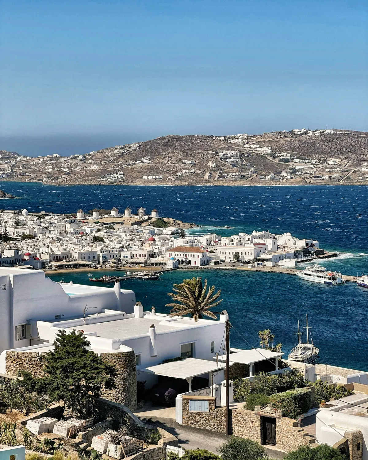 Mykonos town and harbour seen from the hills above